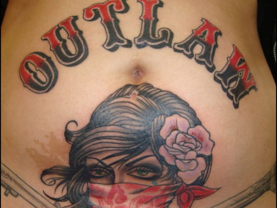 Outlaw stomach tattoo