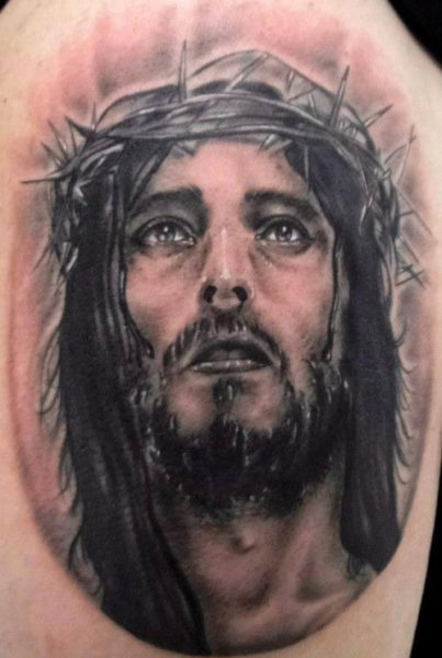 Jesus Face Tattoo On Arm