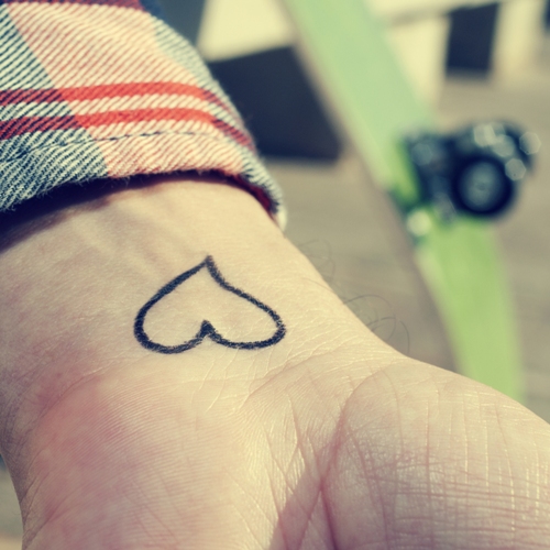 small love tattoos on wrist for men