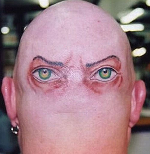 Eyes at the back of the head tattoo