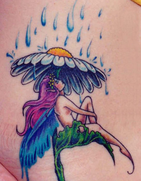 Fairy Sitting under the Rain Fairy Tattoo