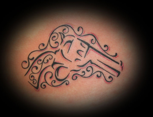 tribal gun tattoo designs