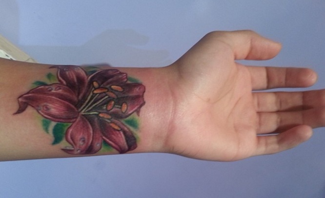 lily tattoos on wrist