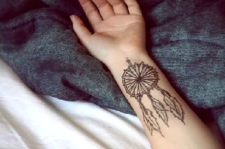 flower dreamcatcher tattoo