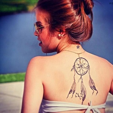 dream catcher tattoo on back