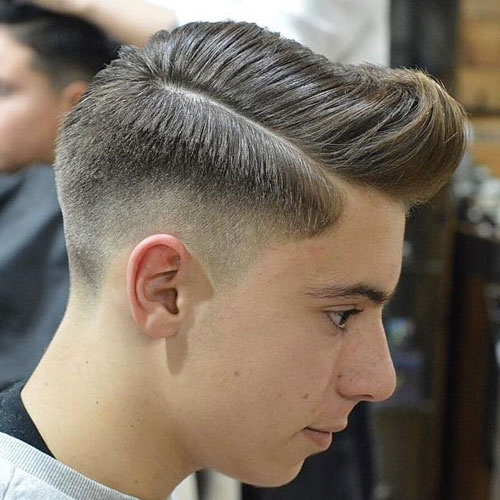 Pompadour with Hard Part and Mid Skin Fade