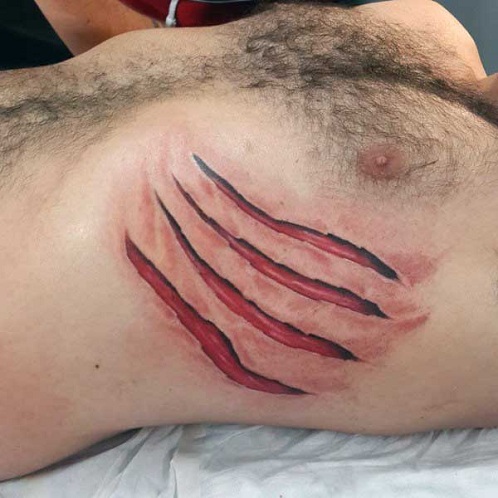 Impressive Ripped Skin Tattoo Design