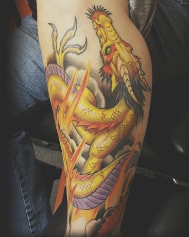 Golden dragon sailor tattoo