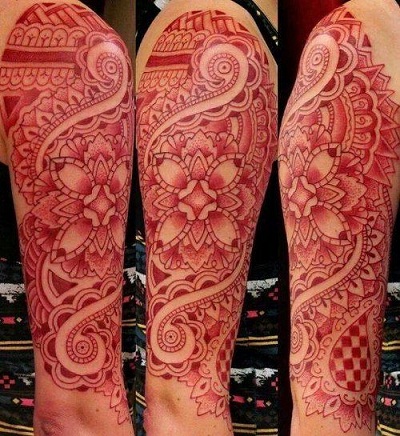 Complex red tattoo design