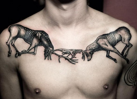 Fighting deer collar bone tattoo