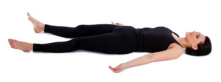 Performing Steps For Shavasana or Corpse Pose