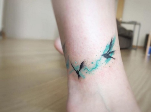 abstract bird tattoo