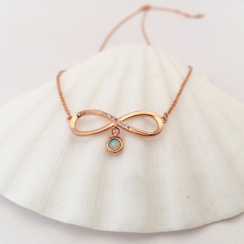 Rose gold-white opal ribbon pendant